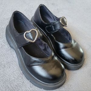platform shoes with heart buckle